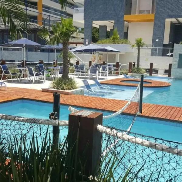 Apto pé-na-areia em Bertioga - Indaia Home Club