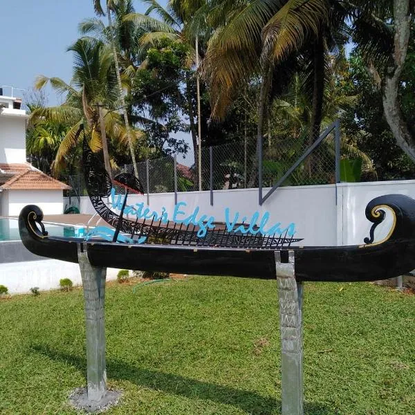 Water's Edge Villas: Ambalapulai şehrinde bir otel