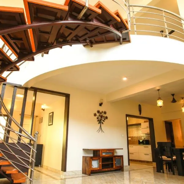 Falcon Suites Yelahanka New Town, hotel di Bangalore