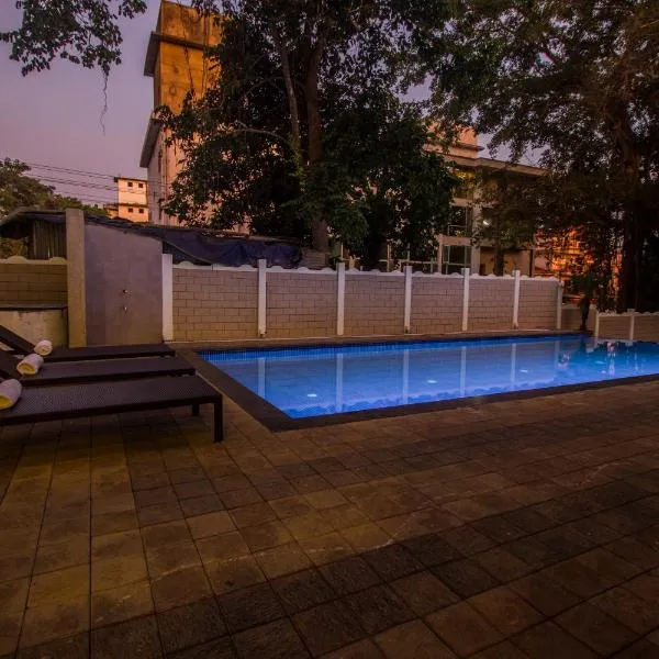 Woodside Retreat Serviced Apartments, 100 meters from baga river, hotel in Baga