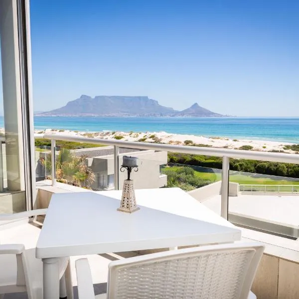 Luxury Private Beachfront 2 bedroom Dolphin Apartment, Blouberg, Cape Town, hotel in Bloubergstrand
