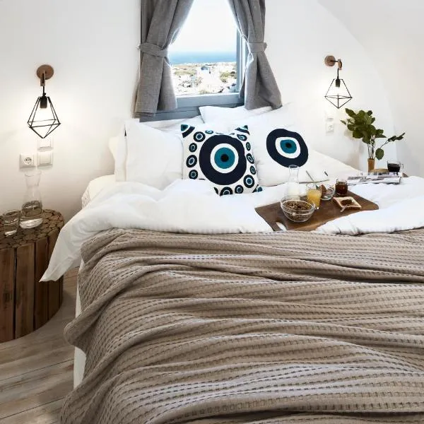Pnoi Luxury Suites, hotel v destinaci Karterados