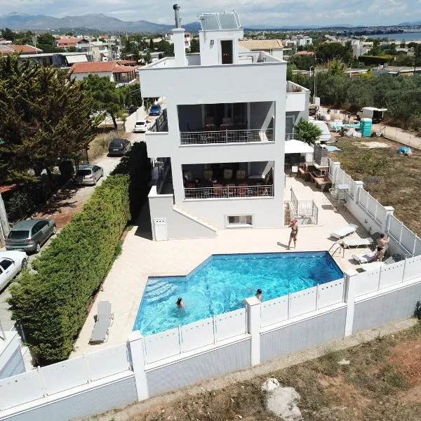 Villa d'Irene-near athens airport , 200 meters from the beach davis โรงแรมในอาร์เตมีดา