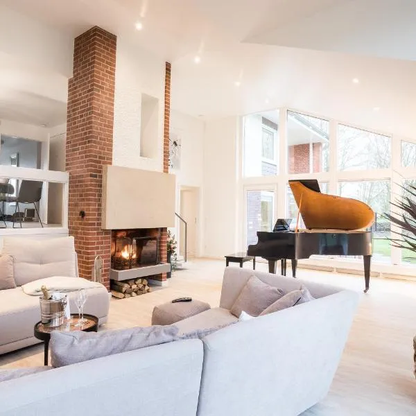 5 Sterne Ferienhaus Emmelsbüll, hotel in Emmelsbüll-Horsbüll