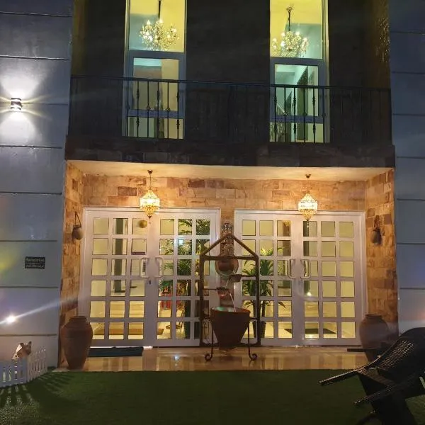 Muscat Royal Suites, hotell i Al Khawḑ