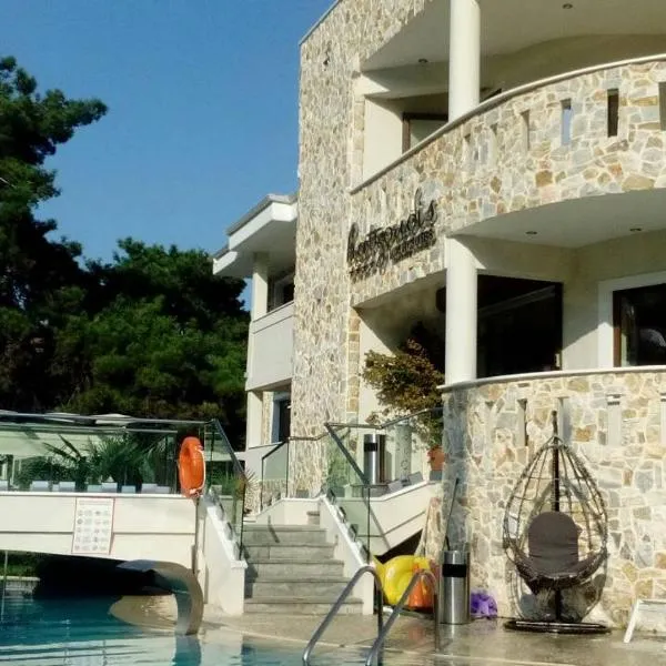 Hatzoudis Luxury Suites, hotel di Chrysi Ammoudia