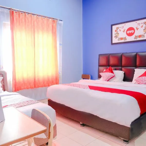 OYO 778 Guest House Amalia Malang, hotel en Karanglo