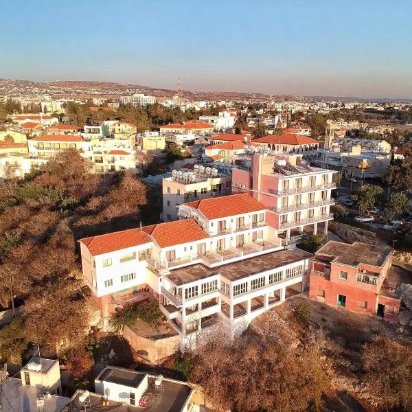 Axiothea Hotel, hotel in Tsadha