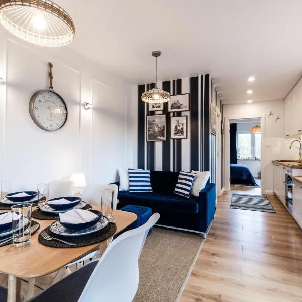 Niebieskie Apartamenty Rowy Apartament z klimatyzacją 100 m do plaży, hotel en Rowy