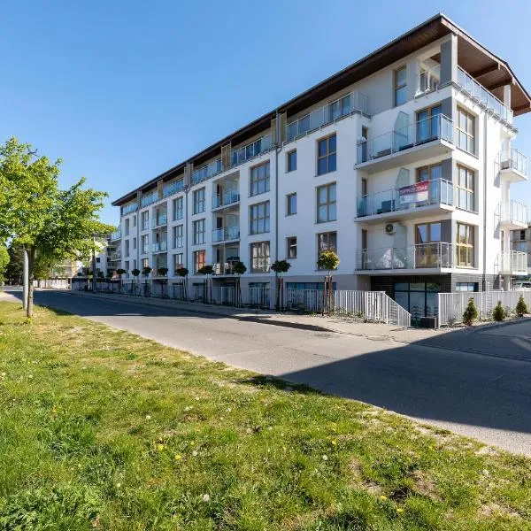 Apartamenty Słoneczne Tarasy by Noclegi Renters, hotel v destinácii Dziwnówek