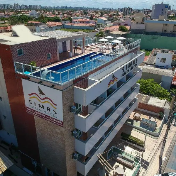 Simas Praia Hotel، فندق في أراكاجو