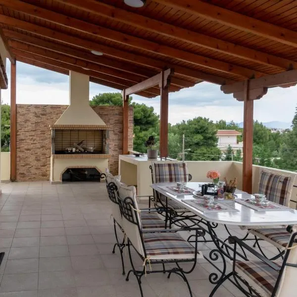 Rose's House (Near Airport), Hotel in Artemida