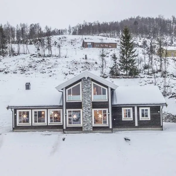 Rolfhytta - Fosskamben 19, hotel in Sogndal