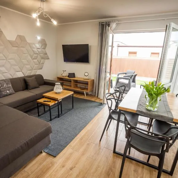 Apartamenty Bałtyckie - Sloneczna Oaza - Parking, Taras, Ogród, WIFI, Hotel in Dębina-Ustka