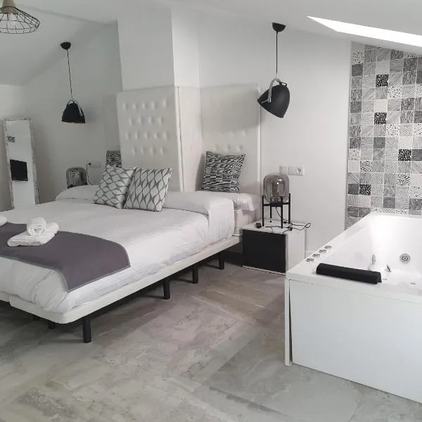 Apartamentos Hostal Cabañas, hotel v destinaci Carboneras de Guadazaón