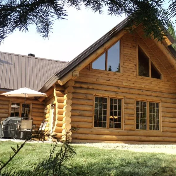 Le Chalet Le Bois Rond Des Ruisseaux, hotel in L'Isle-aux-Grues