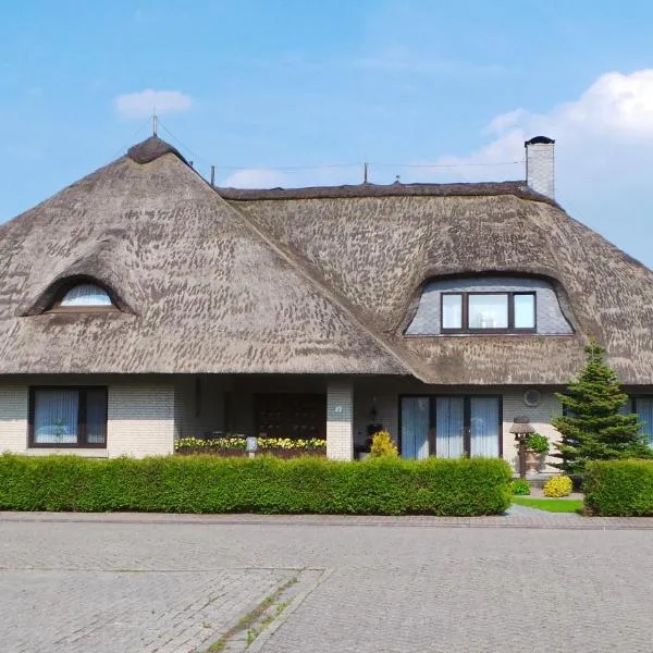 Ferien im Reetdachhaus – hotel w mieście Berumerfehn