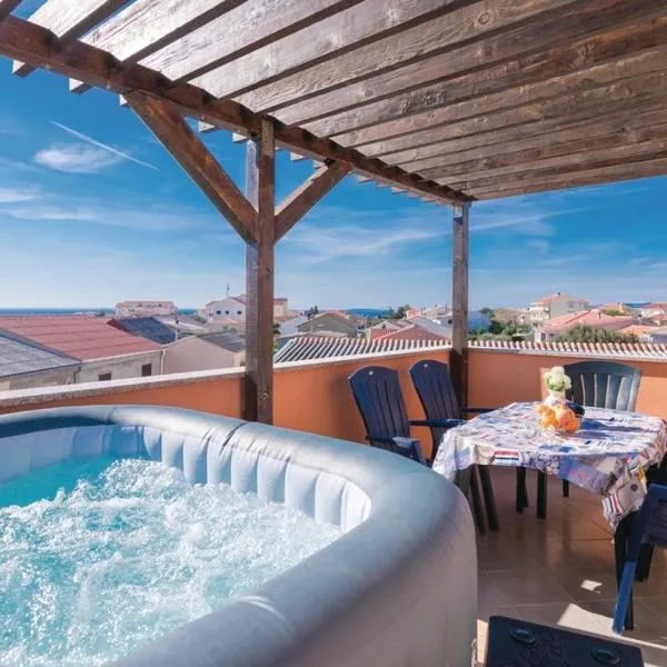 MILKA APARTMANI POVLJANA, hotel in Povljana