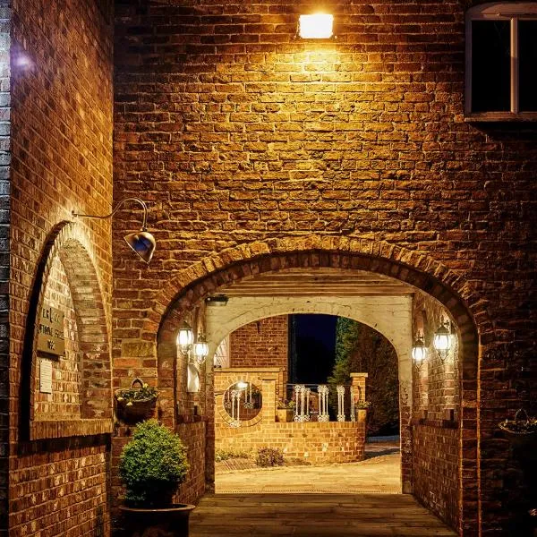 굴에 위치한 호텔 Loftsome Bridge Hotel