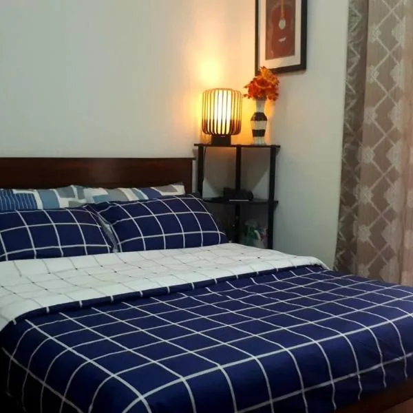 Comfy condo unit 5mins from Mactan Airport+Netflix, hotel in Mactan