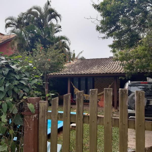Casa Rústica praia da Ferrugem próximo praia com piscina compartilhada