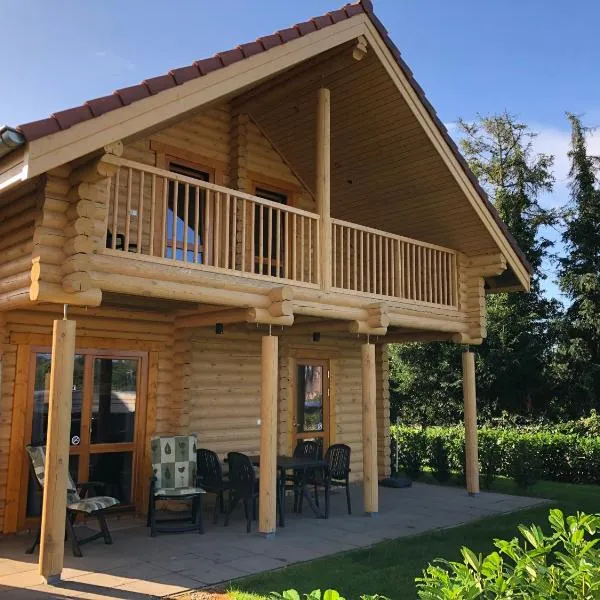 Boomstamhuis High Chaparral, hotel en Oirsbeek