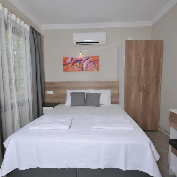 SELERDOĞA EVLERİ, hotel a Muğla