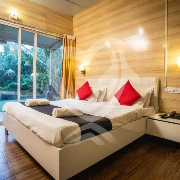Zulu Land cottages - near Curlies beach shack and shiva valley - Anjuna beach, отель в Анжуне