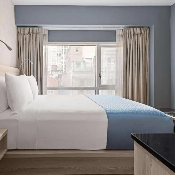 Wingate by Wyndham New York Midtown South/5th Ave, хотел в Glendale