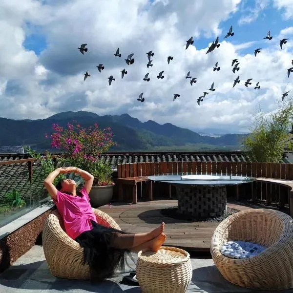 Viesnīca Shan Ju Qiu Ming Floral Hotel in Tengchong 花筑 腾冲山居秋暝精品客栈 pilsētā Tenčuna
