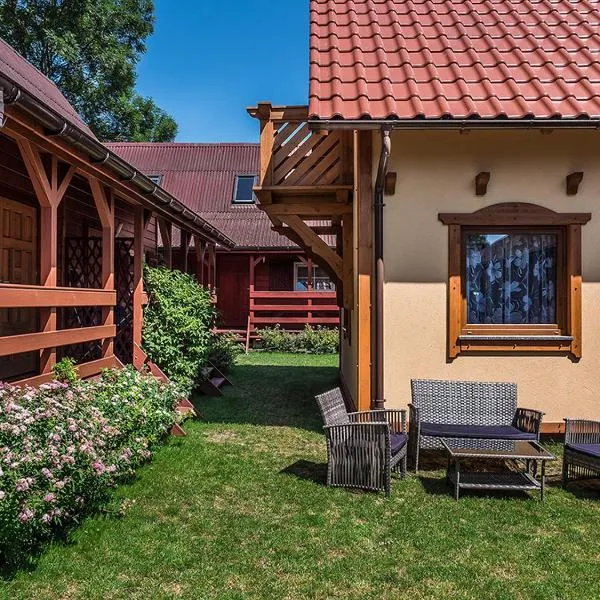 U SYLWI Domki Drewniane, hotel in Trzęsacz
