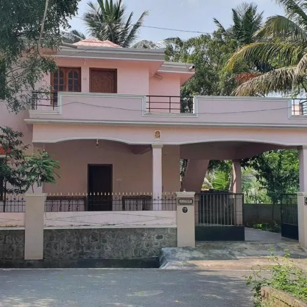 Podhigai Garden Villa, hotel v destinácii Kuttalam