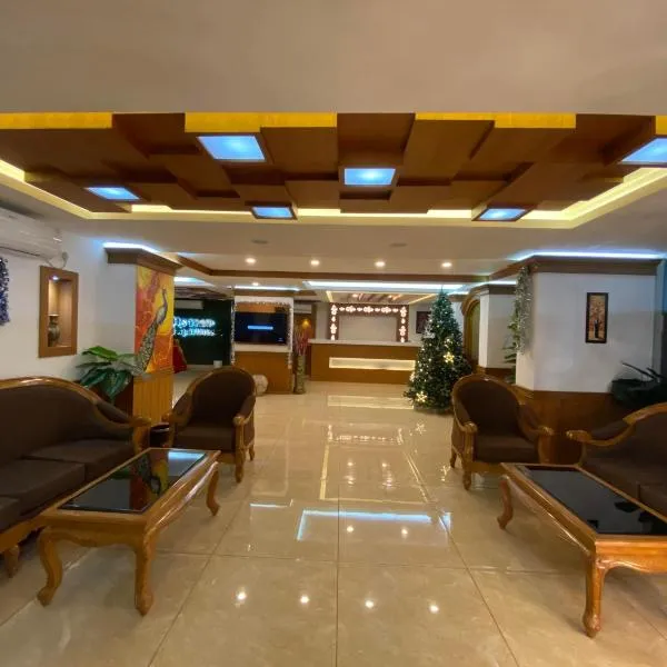 Utsavam Hotel Apartments, hotel v mestu Guruvāyūr