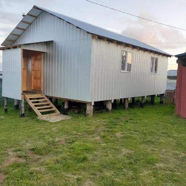 Cabaña Emilia Quinchen, отель в городе Ла-Чакра