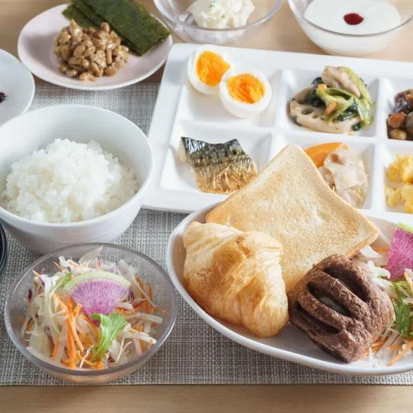 Super Hotel Midosujisen Esaka โรงแรมในซุอิตะ