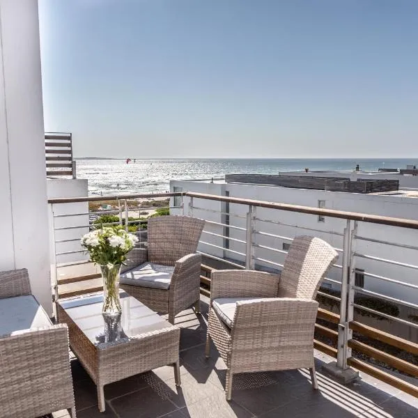 Spectacular Sea View Apartment 257 Eden on The Bay, Blouberg, Cape Town, hotel in Bloubergstrand