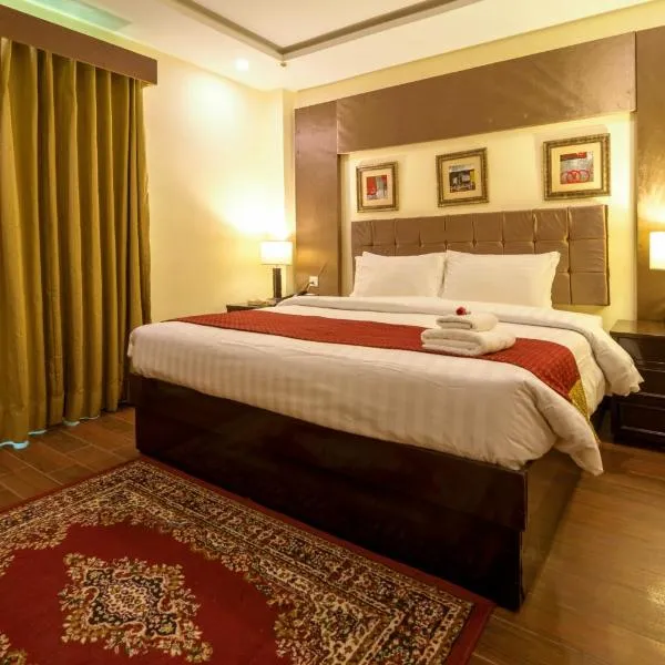 Hotel One Faisalabad, hótel í Faisalabad