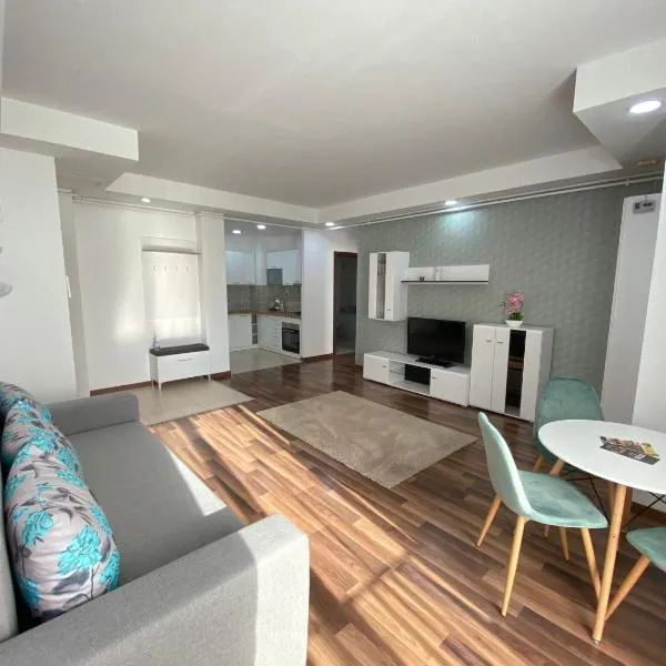 Green Deluxe Apartment Cosmopolis, хотел в Ştefăneştii de Jos