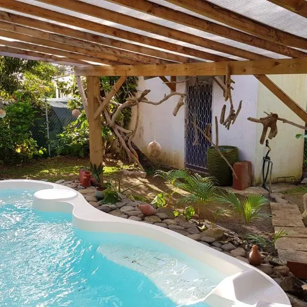 Appartement d'une chambre avec piscine partagee jardin clos et wifi a Le lamentin a 9 km de la plage, hôtel au Lamentin