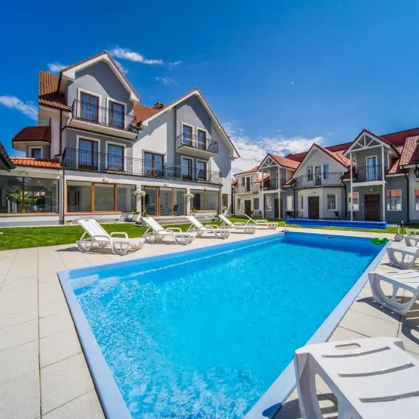 Rewit Dom Goscinny z podgrzewanym basenem, hotel a Rewal