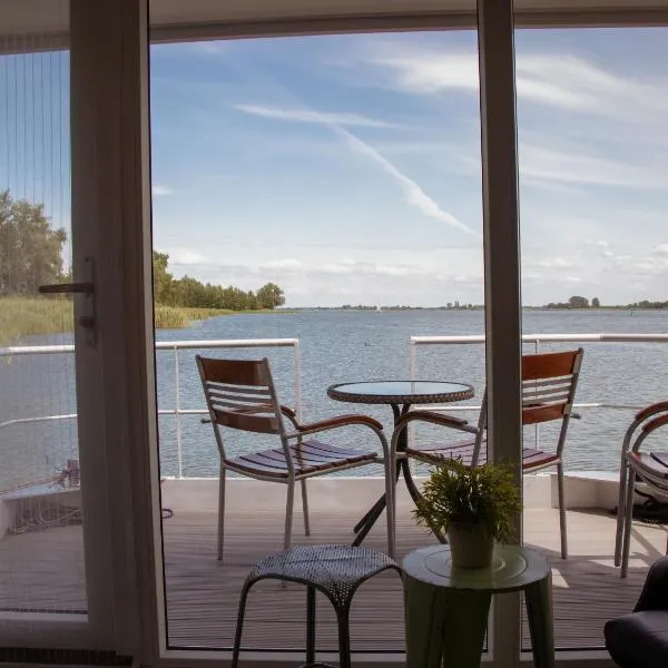 Houseboat uitzicht over veluwemeer, natuurlokatie, prachtige vergezichten, hotel v destinaci Biddinghuizen