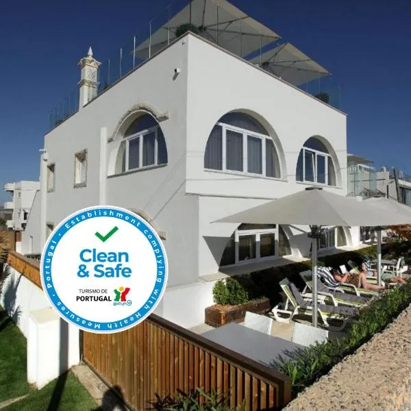 Golden Beach Guest House & Rooftop Bar, hotel in Faro