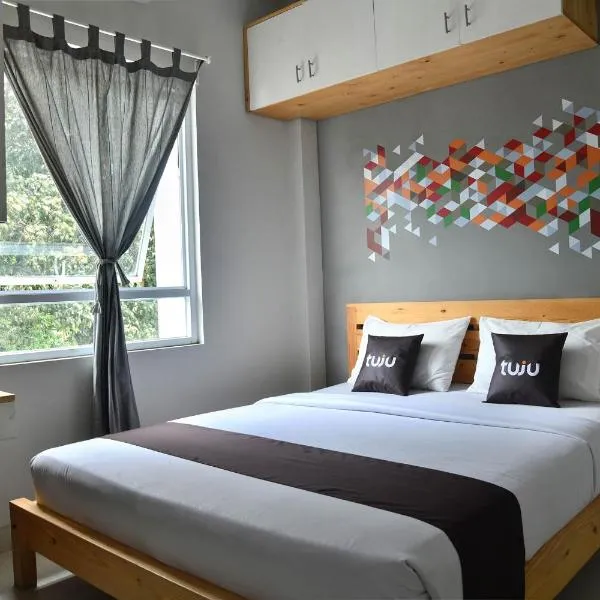 Tuju WK Homes Syariah, hotell i Pondokcina