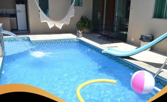 Linda Casa com Sauna, Hidromassagem, Piscina, Cascata, Churrasqueira e Suíte Master!! - Foto 4