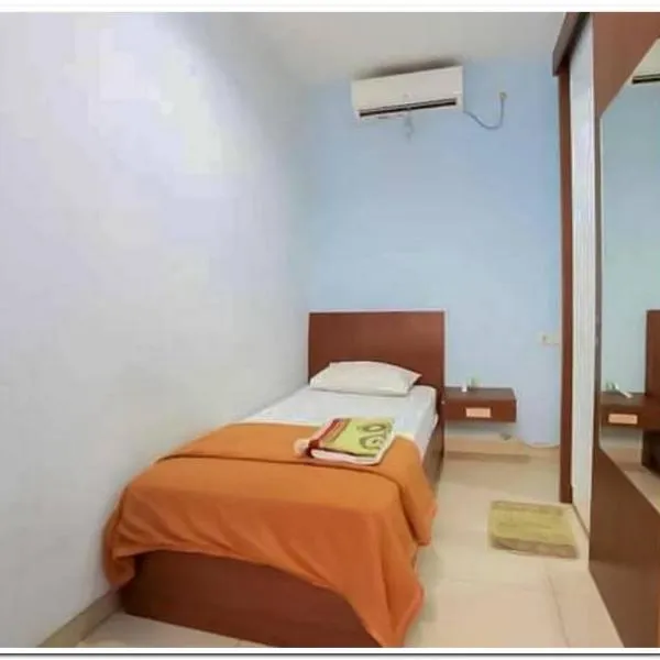 The Nancy's Homestay Pekanbaru Mitra RedDoorz, hotell i Pekanbaru