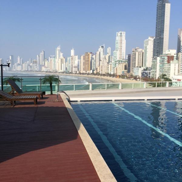 Loft beira-mar/piscina e com estacionamento