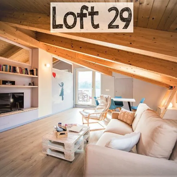 Loft 29 mansardato con ampio terrazzo, hotel di Chianocco