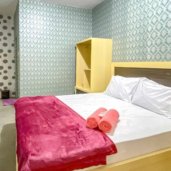 Tini's Guest House Malang Mitra RedDoorz, hotel in Betek