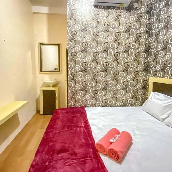 Tini's Guest House Malang Mitra RedDoorz, hotel in Betek