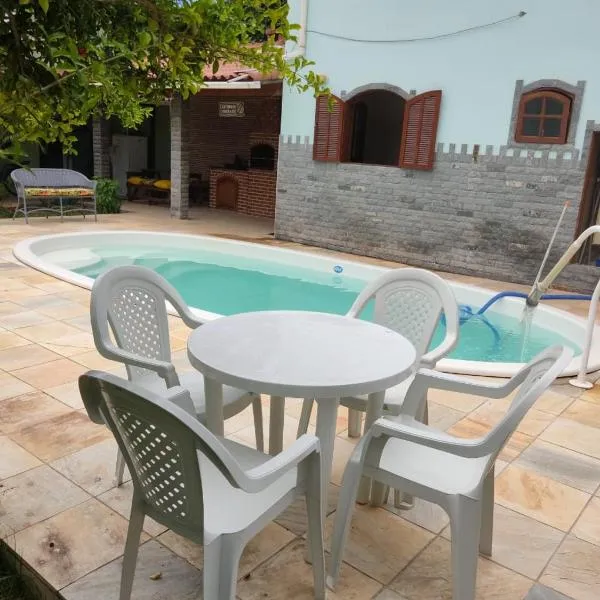 Casa a 3 minutos da praia, hotel em Jaconé